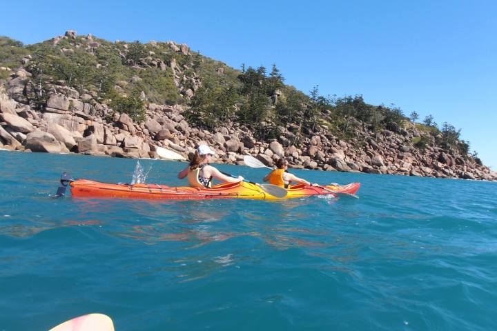 orange and yellow kayak