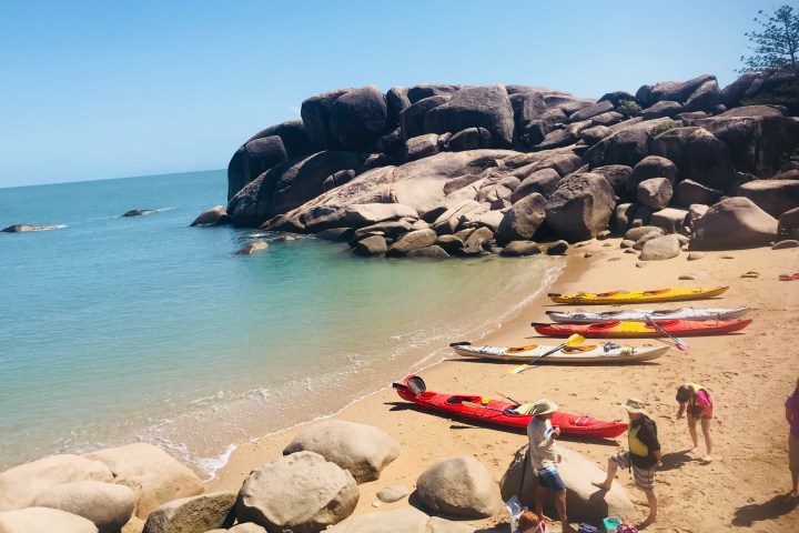5 kayaks on the beach